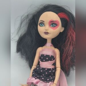 Doll with Black and Pink Polka Dot Dress